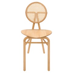 Juego de cuatro sillas de comedor contemporáneas de roble con respaldo de caña - Modelo Dumick