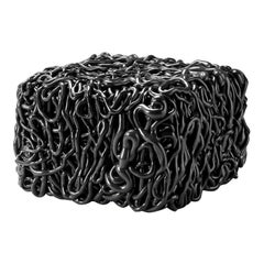 Pouf Senzafine in poliuretano nero di Gaetano Pesce