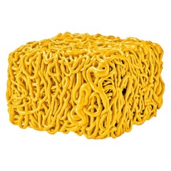 Pouf Senzafine in poliuretano giallo di Gaetano Pesce