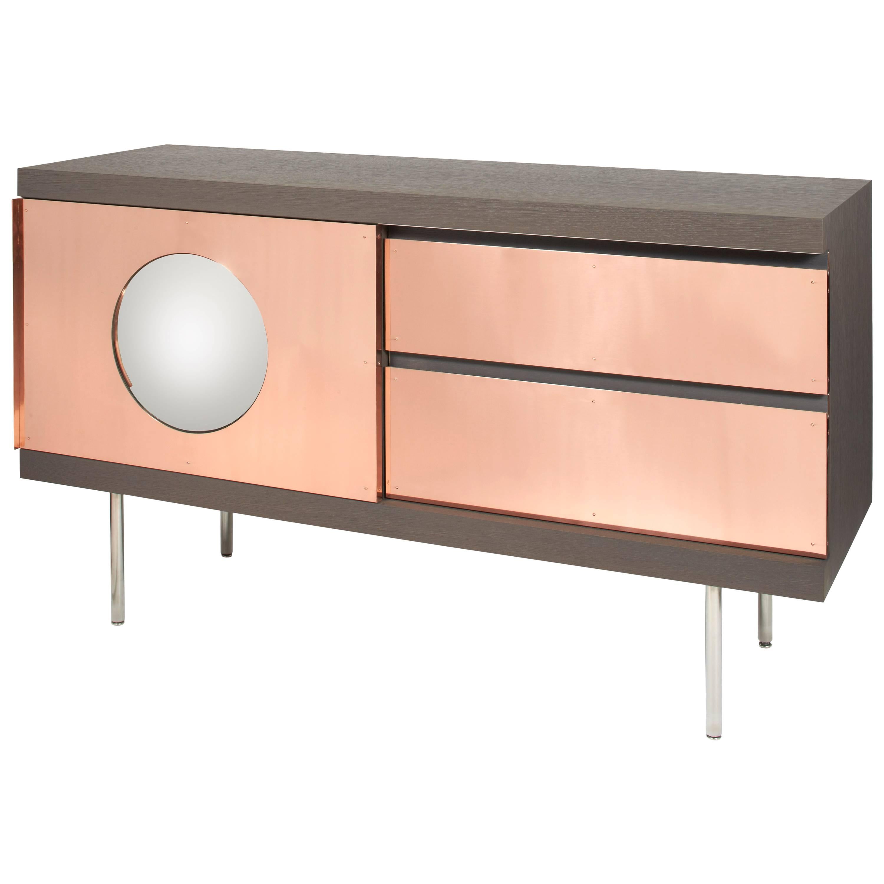 Alice. Sideboard; brushed stained oak. Copper. Convex mirror. Patrick Naggar.