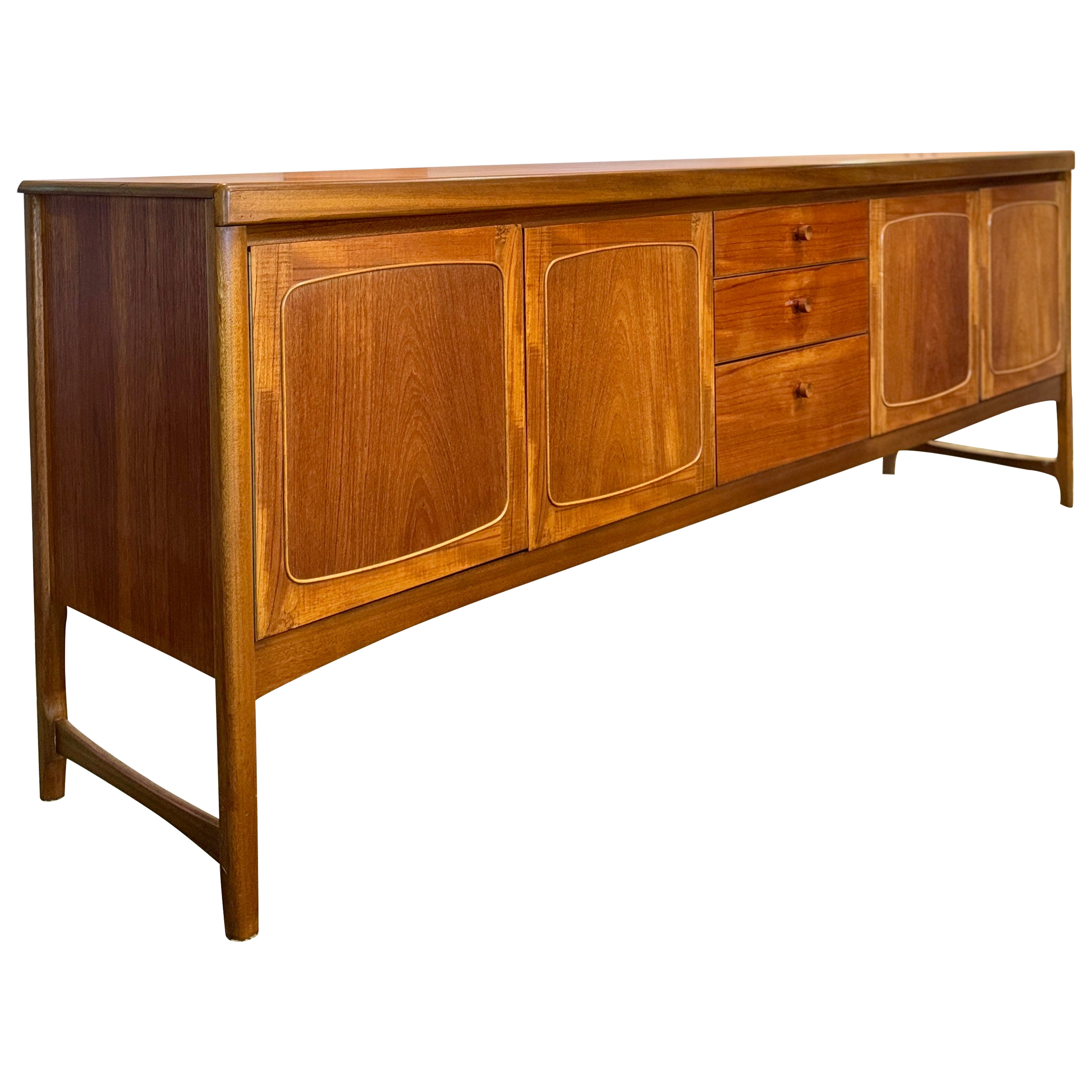 A beautiful, extra long teak sideboard by Nathan Furniture, called “Squares.”