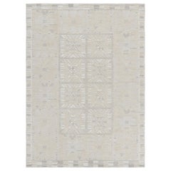 Tapis de style scandinave à motifs géométriques crème et beige de Rug & Kilim