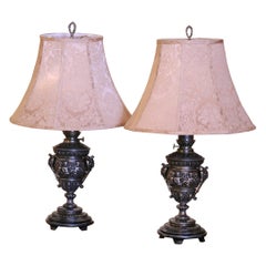 Antique Pair of 19th Century French Polished Repousse Urn-Shaped Table Oil Lamps