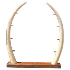 A large “éléphant tusk” étagère, circa 1960