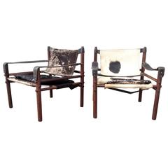 Pair of Arne Norell Sirocco Chairs in Rosewood and Cow Hide