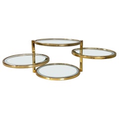 Italian modern round coffee table in brass with 4 adjustable glass tops, 1970s