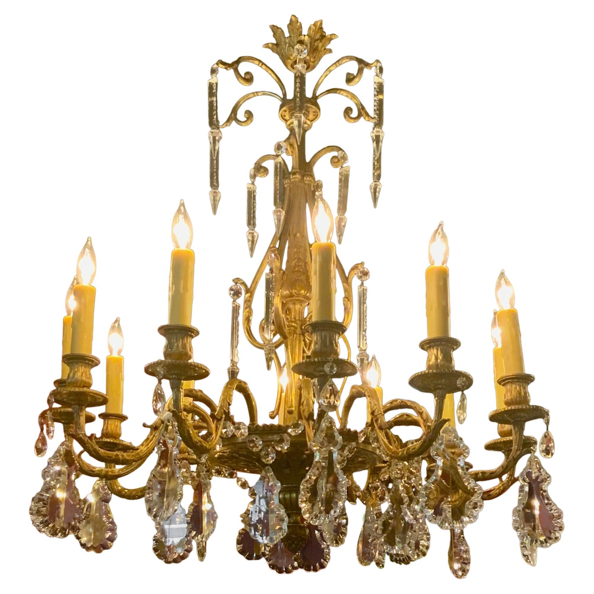 Antique Bronze and crystal twelve light chandelier