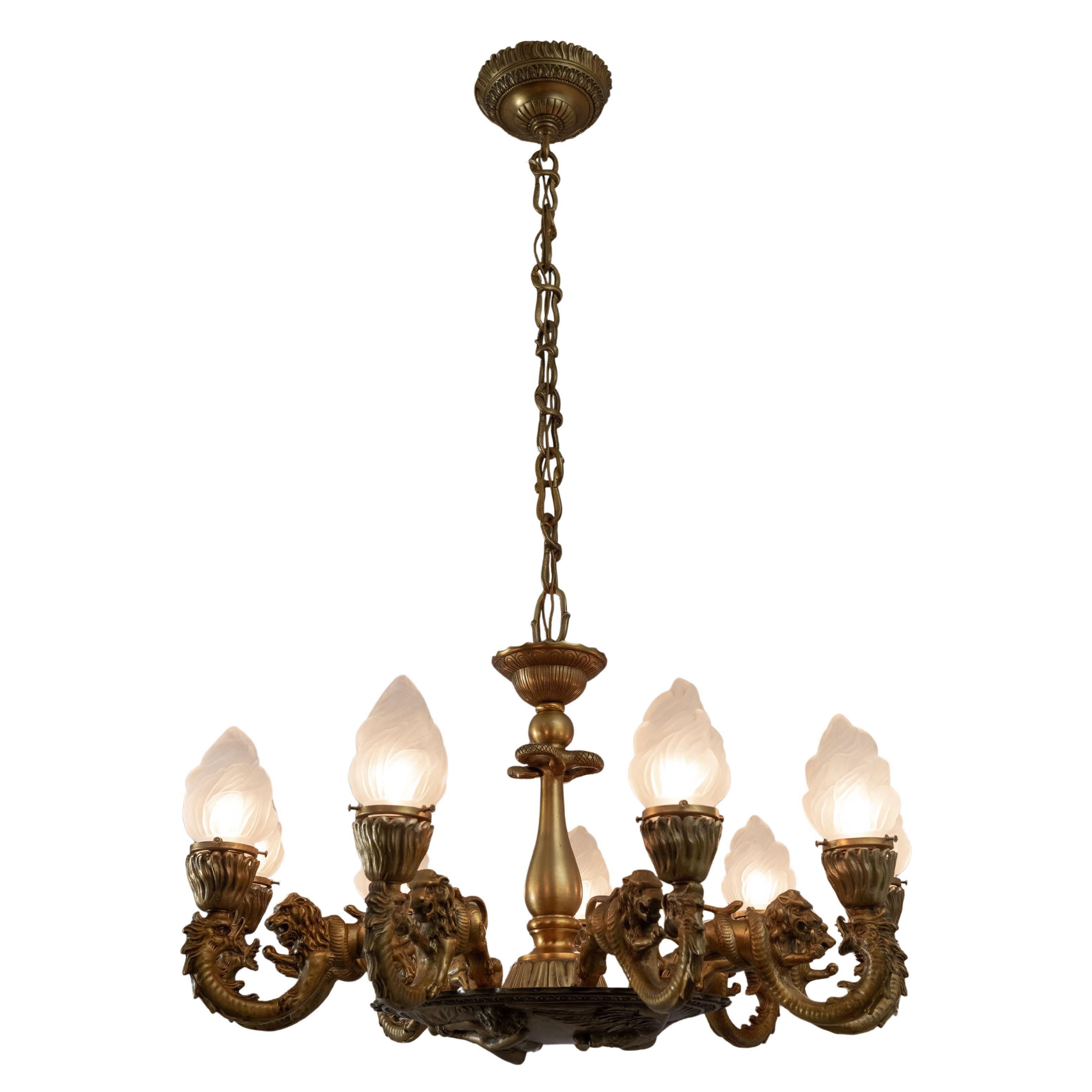 Lampadario a 9 bracci in bronzo dorato con leoni, gargoyle e prometeo, 1890 ca. in vendita