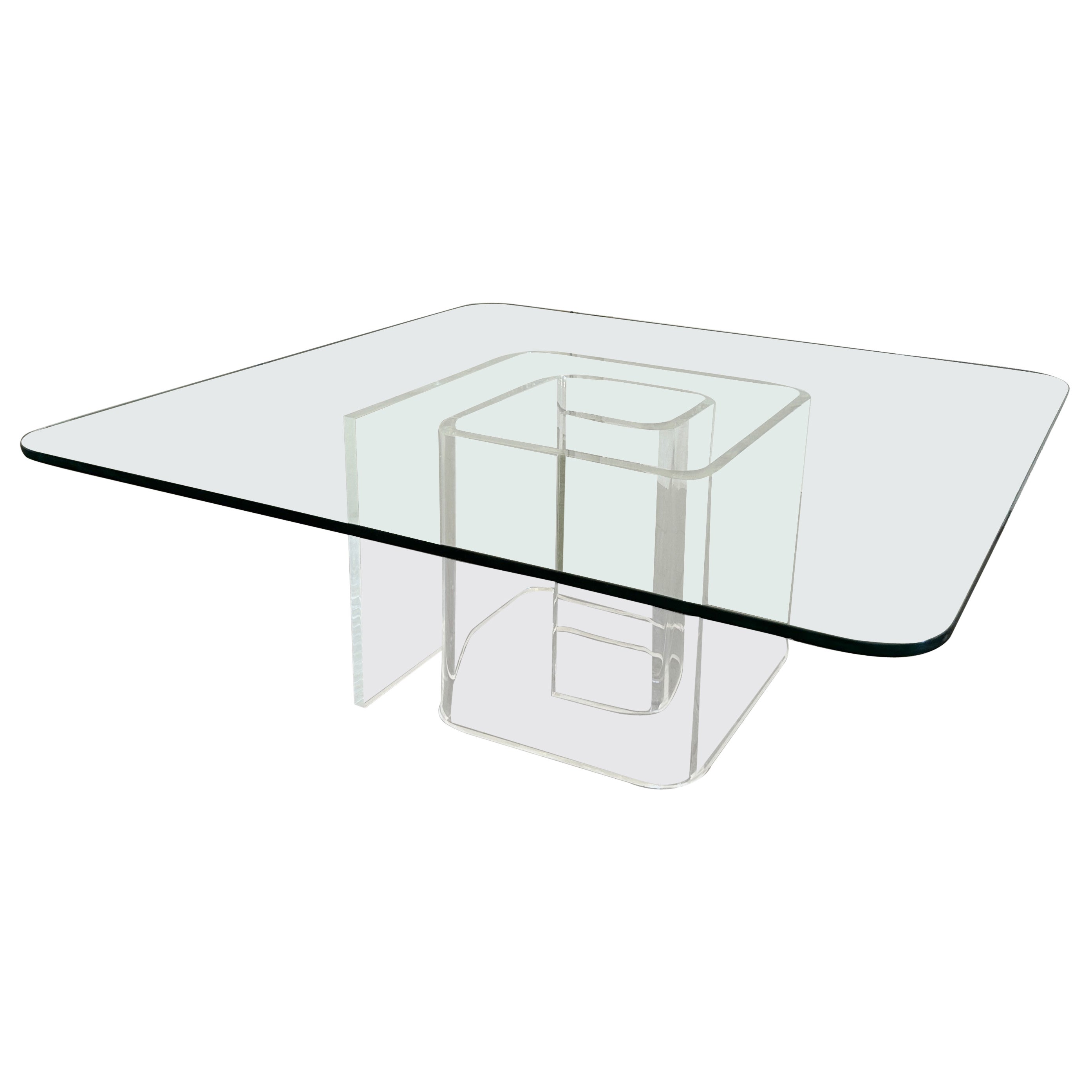Table basse à plateau en verre en forme d'escargot en lucite The Moderns