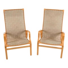 Pair of danish modern bentwood beech woven natural canvas lounge chairs
