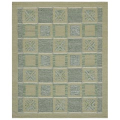 Rug & Kilim’s Scandinavian Rug with Green and Ice Blue Geometric Patterns