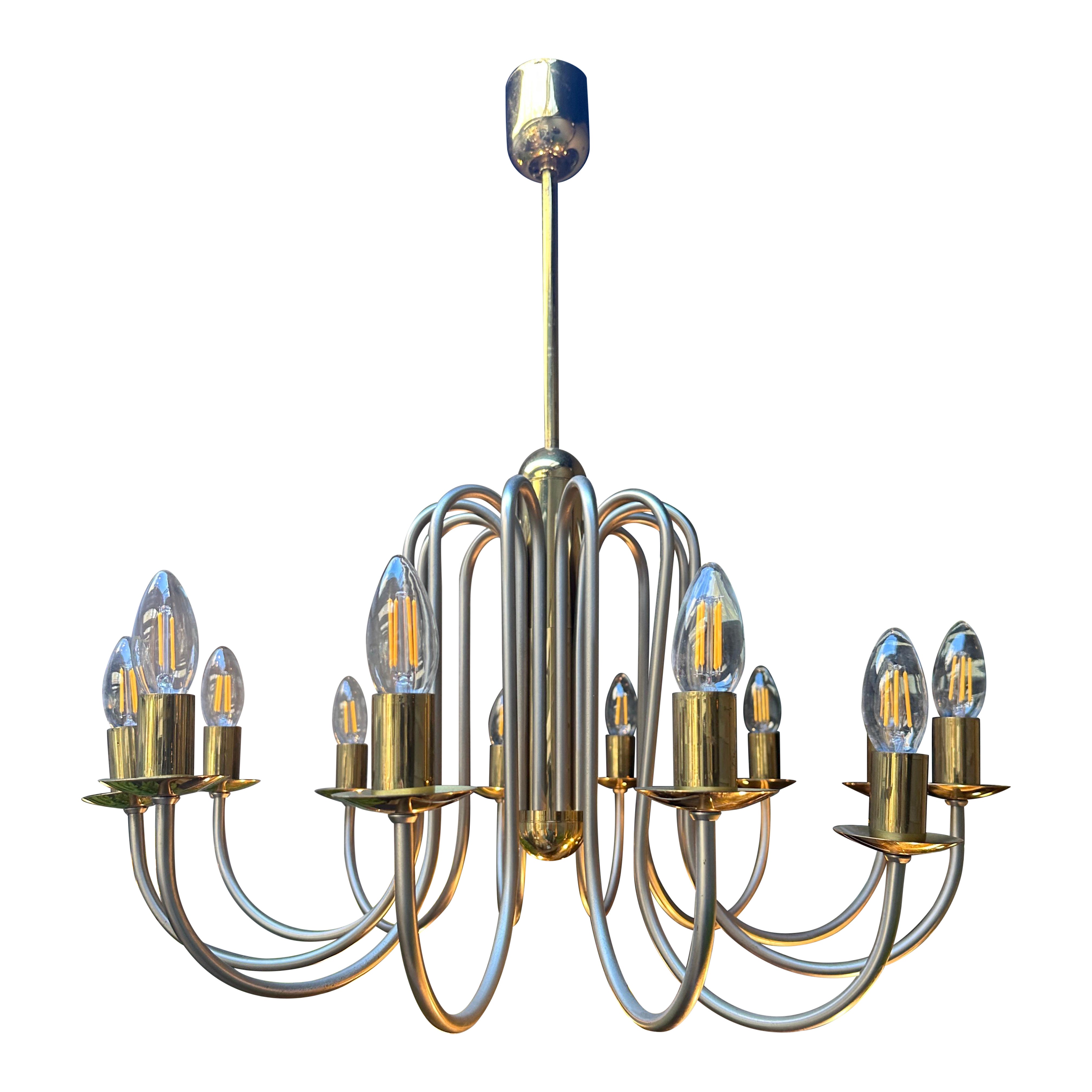 A French Brass And Nickel Finish Twelve Arm Chandelier