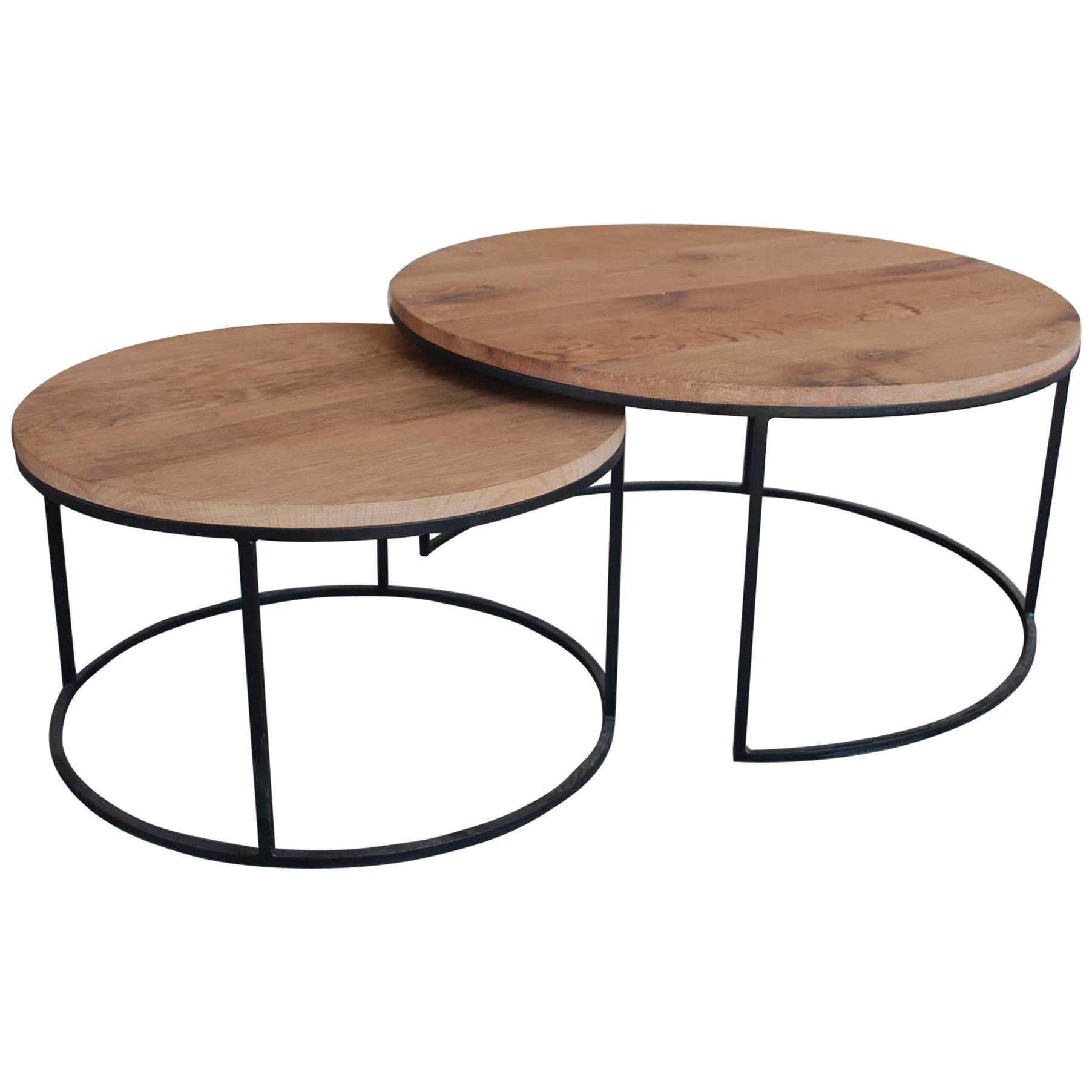  Pair of Contemporary round coffeetables with aged oak top. For Sale