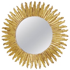 Beautiful Carved Giltwood Sunburst Mirror, France, 1950s
