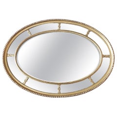 Espejo ovalado dorado con gesso de la época victoriana tardía