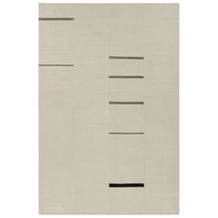 Kilim contemporáneo de Rug & Kilim, blanco con rayas negras, detalles en beige