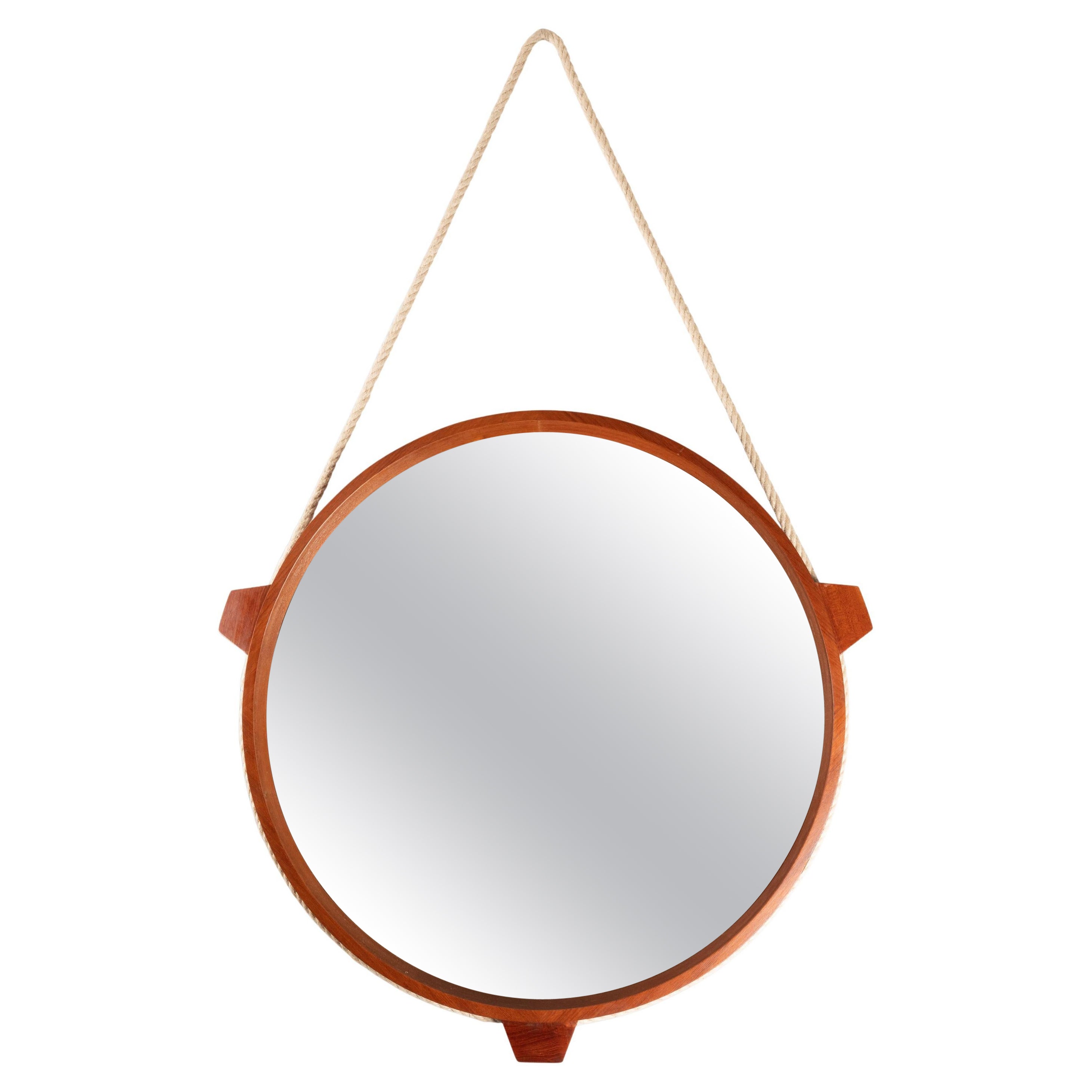 Round walnut framed mirror with rope. Italy circa 1950.