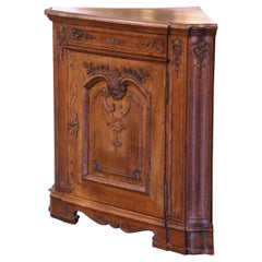 Early 20th Century French Louis XIV Carved Oak "Encoignure" or Corner Cabinet