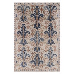 Tapis de style Ikats de Rug & Kilim en bleu et beige sur ivoire