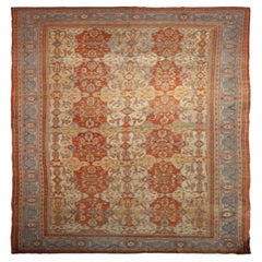 Tapis persan Sultanabad surdimensionné en laine bleu ivoire rouge jaune - 92138