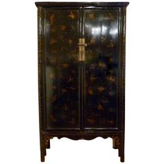Fine Large Black Lacquer Armoire with Gold Gilt Motif
