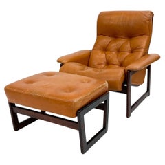 Mid century Dutch modern tufted leather lounge chair and ottoman
