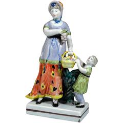 English Staffordshire Walton Pottery Figure of Autumn as a Lady and Child