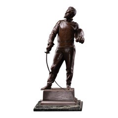 Bronze patinated Statue of Fencer by G.Devreese (1861-1941) .