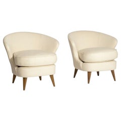 Joaquim Tenreiro, Pareja de Sillones "Concha", Madera Maciza y Tela. c. 1955