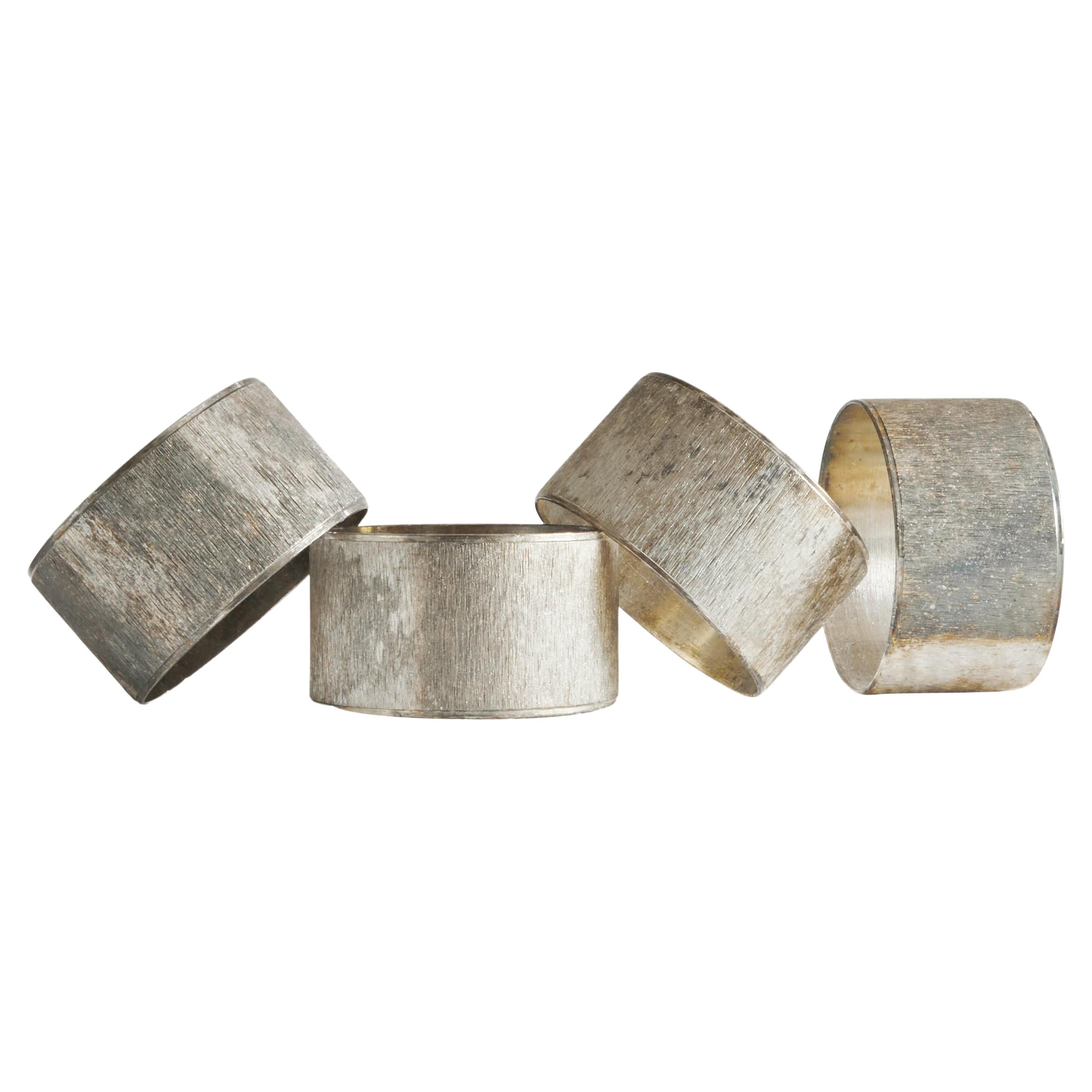 Set of 4 Midcentury Napkin Rings in Patinated Silver