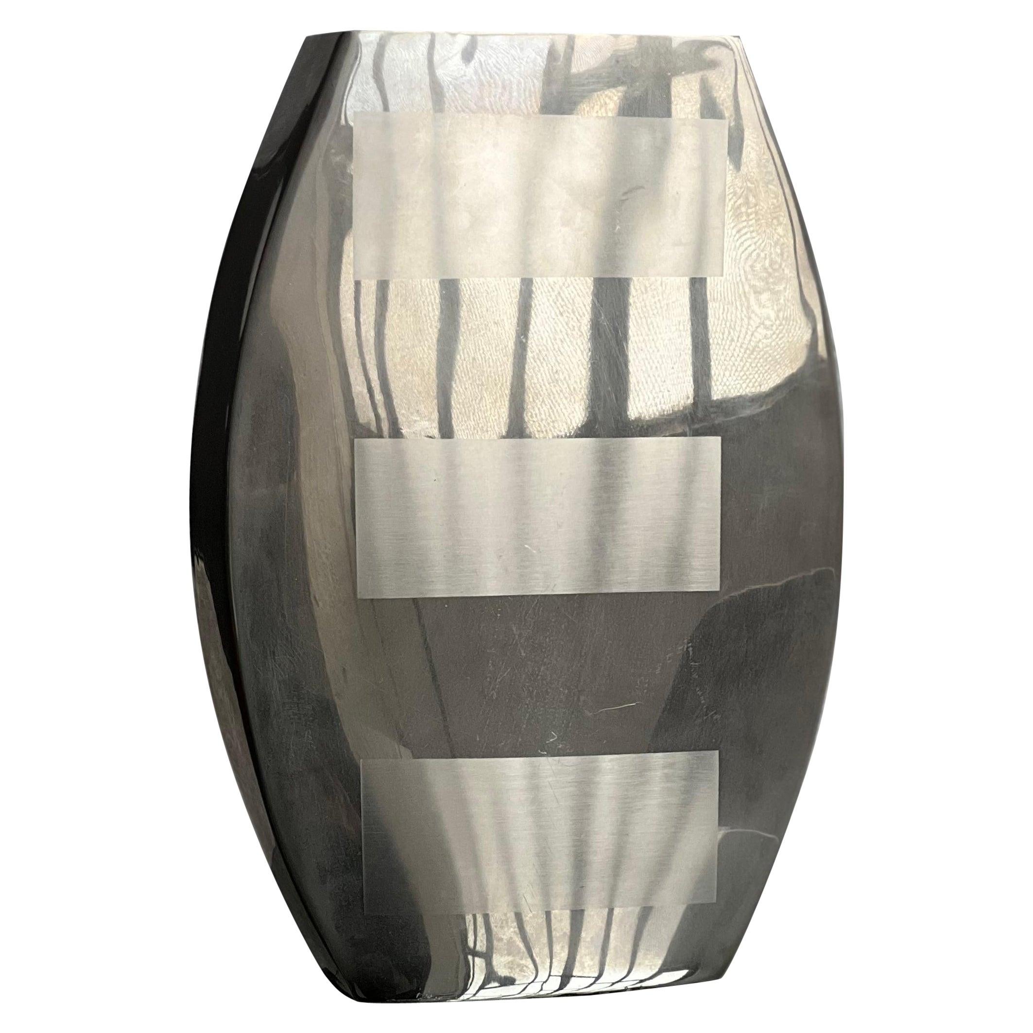 Decorative stainless steel vase with geometrical shapes imprinted, 1970's