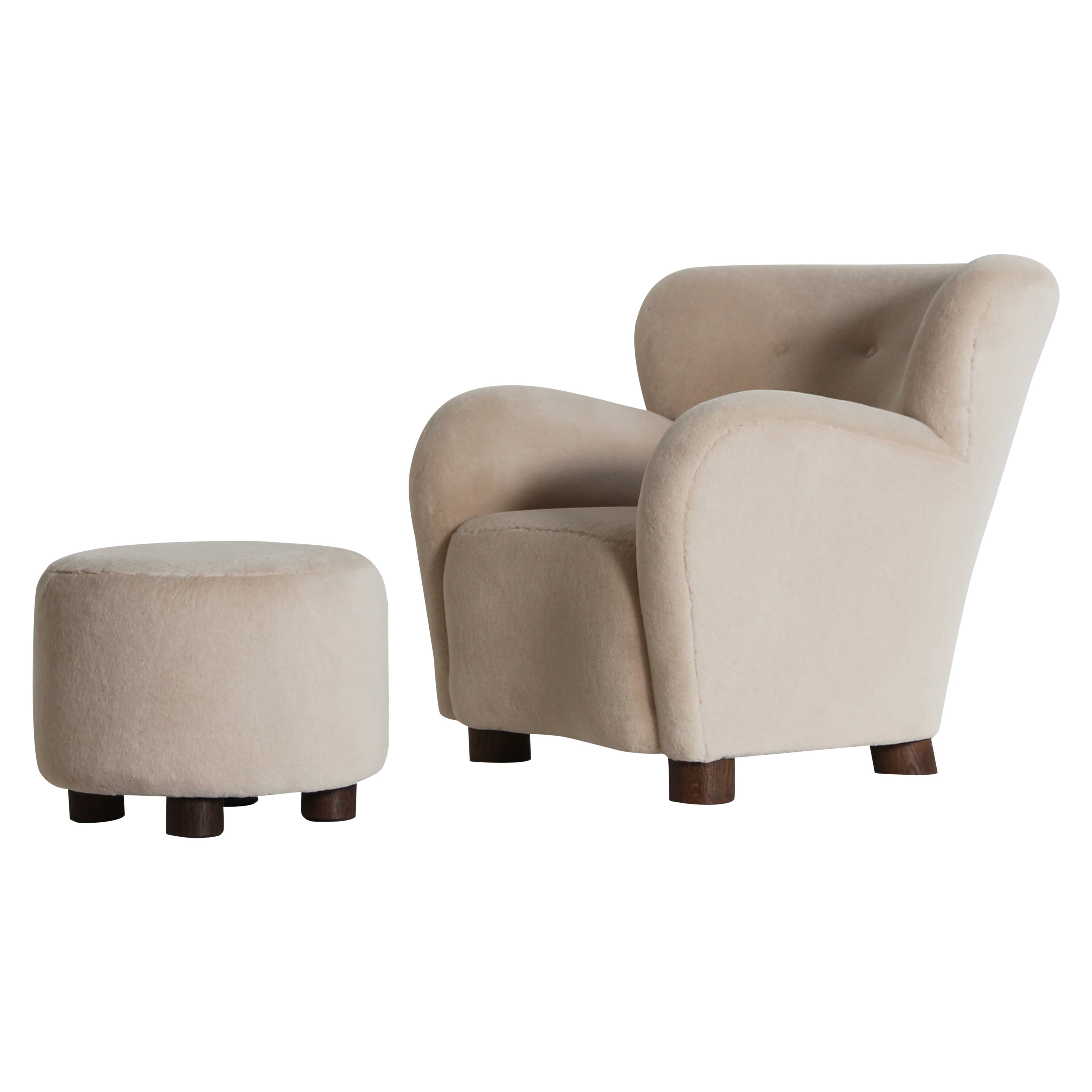 A Lounge Chair / Armchair and Ottoman, Upholstered in Pure Ivory Alpaca