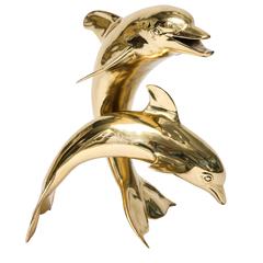 Figural Sculpture of Two Dolphins in Polished Brass
