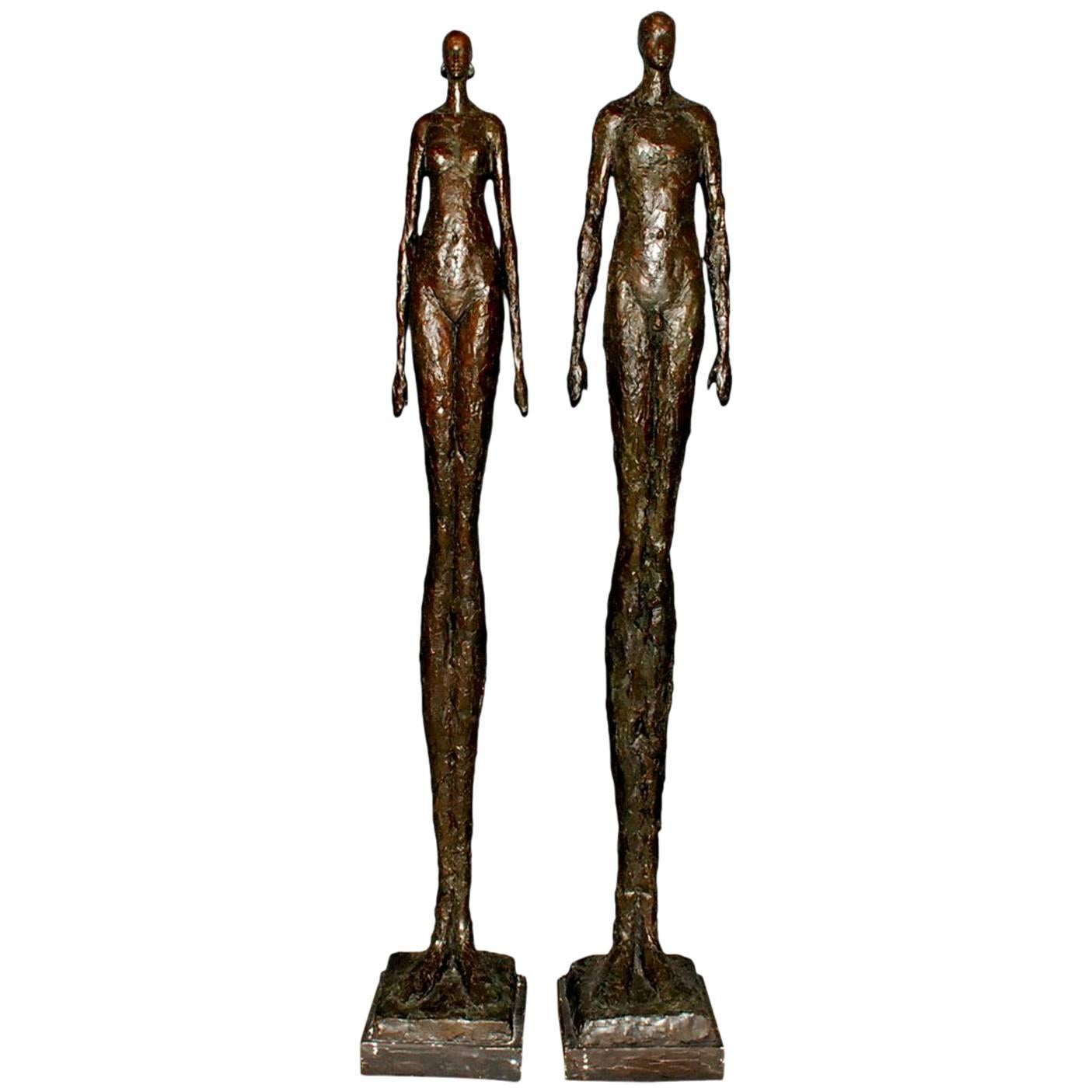 Tall Bronze Man and Woman Sculptures by Tom Corbin
