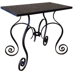 Hollywood Regency Scrolled Wrought Iron and Black Vitrolite Side Table