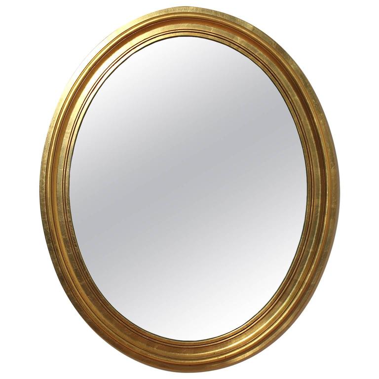 Gold Gilt Wooden Oval Wall Mirror For Sale at 1stdibs