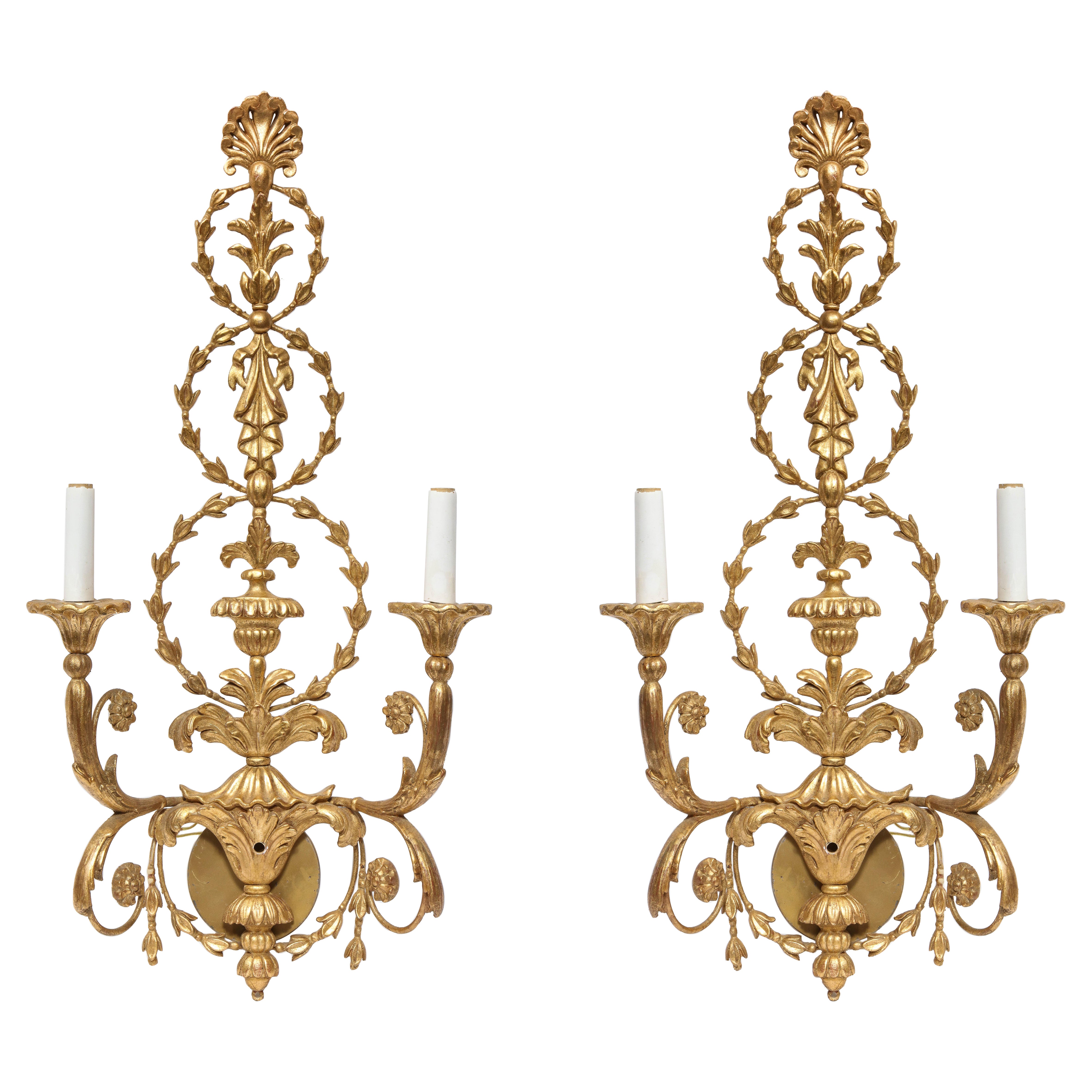 Pair of Large Italian Neoclassical Carved Giltwood Two-Light Wall Sconces