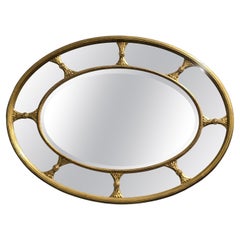 Grand miroir ovale doré anglais Chippendale rare