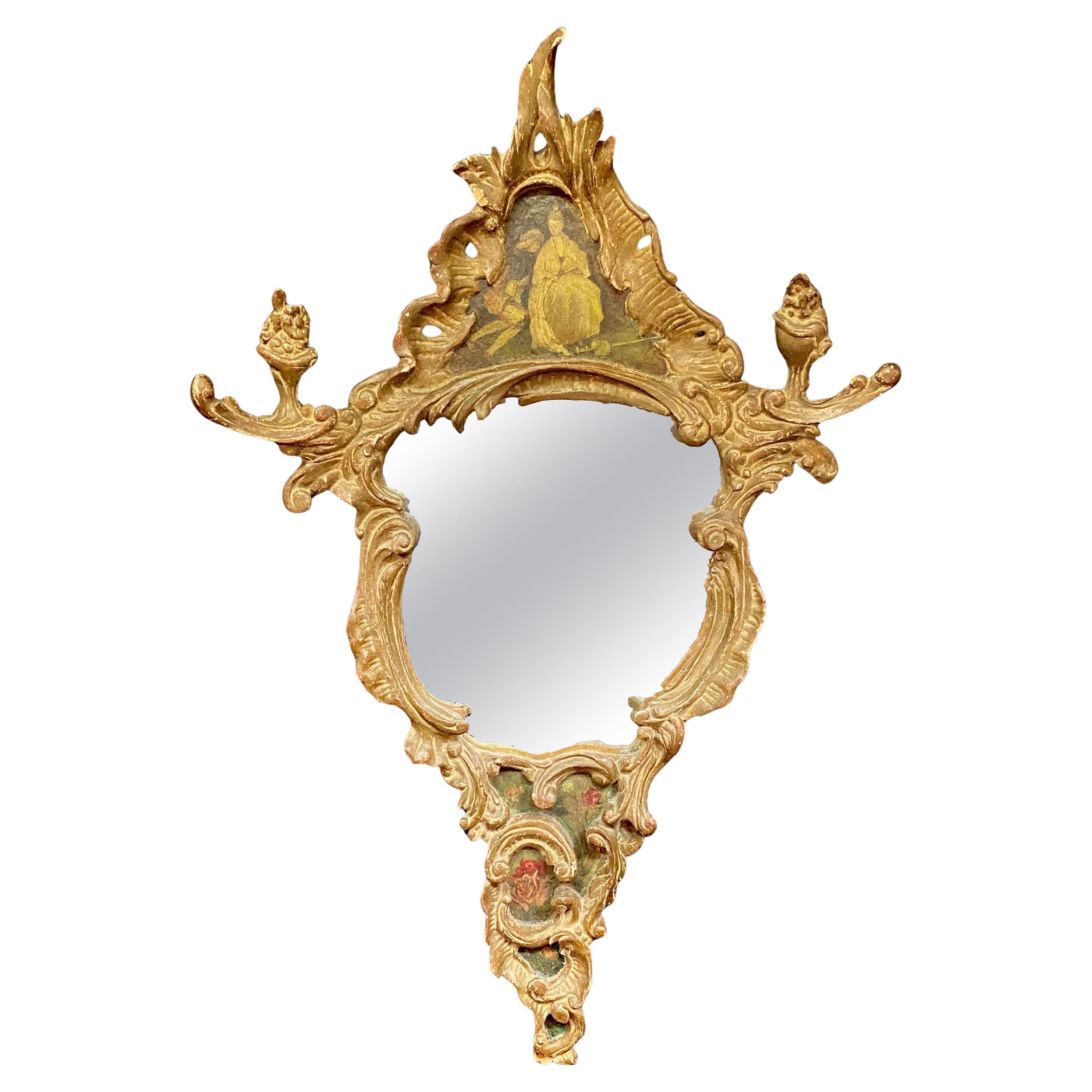 A scrolled mirror in carved and patinated molded wood painted with chinese  XIXè For Sale
