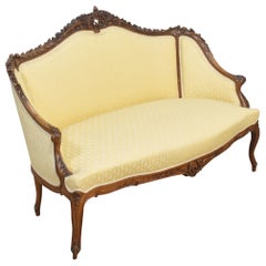 Walnut framed two-seater settee