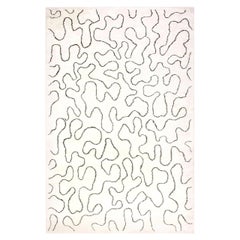 Alfombra contemporánea de lana con diseño de lazo blanco hecha a mano por Doris Leslie Blau