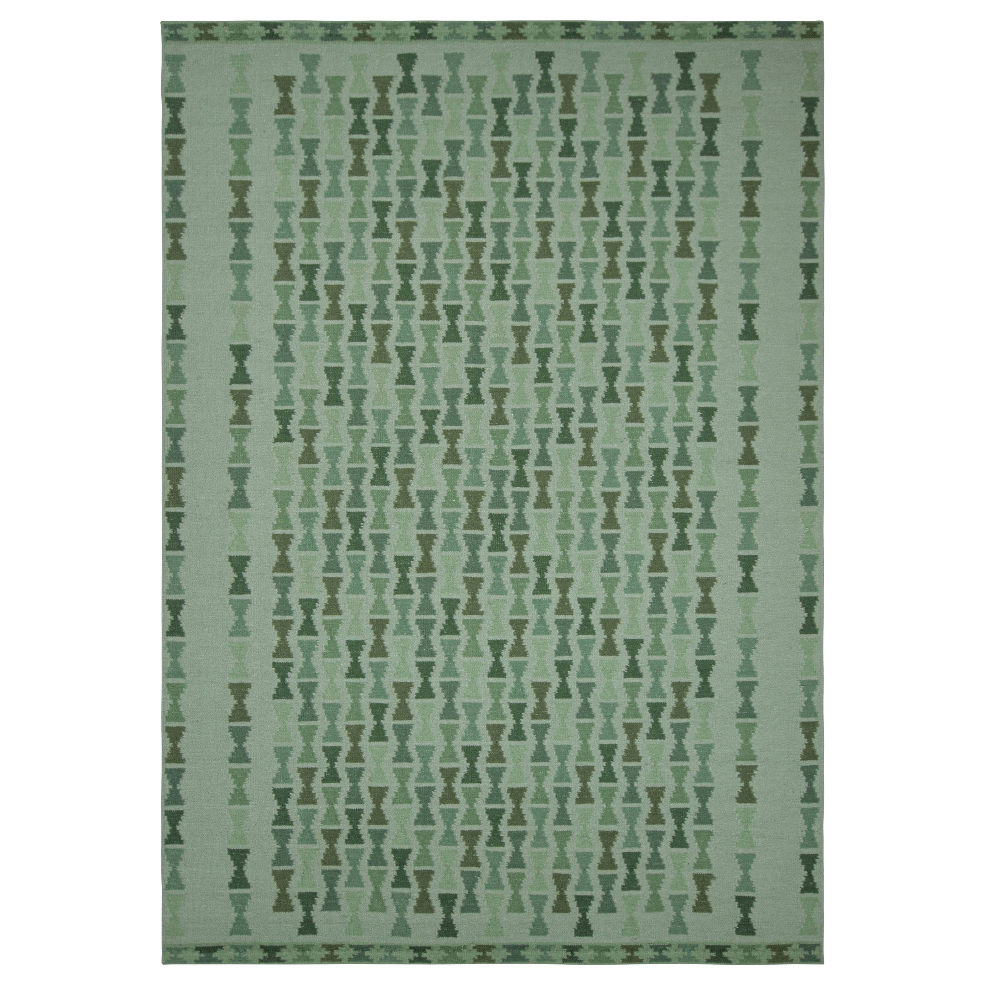 Rug & Kilim's Teppich im skandinavischen Stil mit grünen und blaugrünen Sanduhrmustern