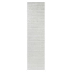 Rug & Kilim’s Oversized Textural Rug In Solid White, Gray and Cream Striae