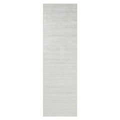 Rug & Kilim’s Oversized Textural Rug In Solid White, Gray and Cream Striae