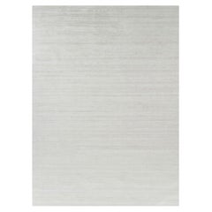 Rug & Kilim’s Oversized Textural Rug In Solid White, Gray and Cream Striae