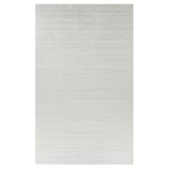 Rug & Kilim’s Oversized Textural Rug In Solid White, Gray and Cream Striae