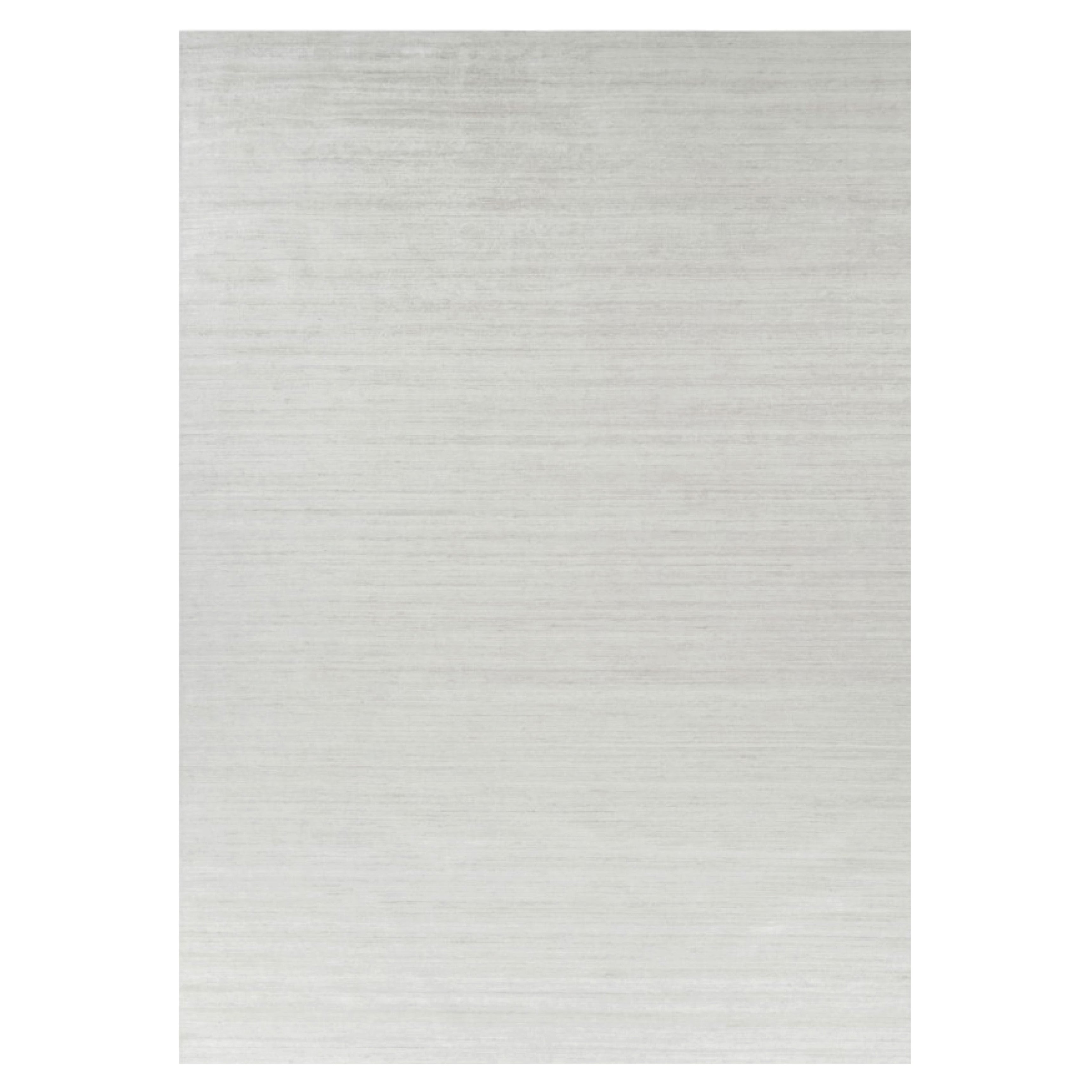 Rug & Kilim’s Oversized Textural Rug In Solid White, Gray and Cream Striae