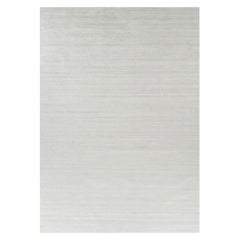 Rug & Kilim’s Oversized Textural Rug In Solid White, Gray and Cream Striae
