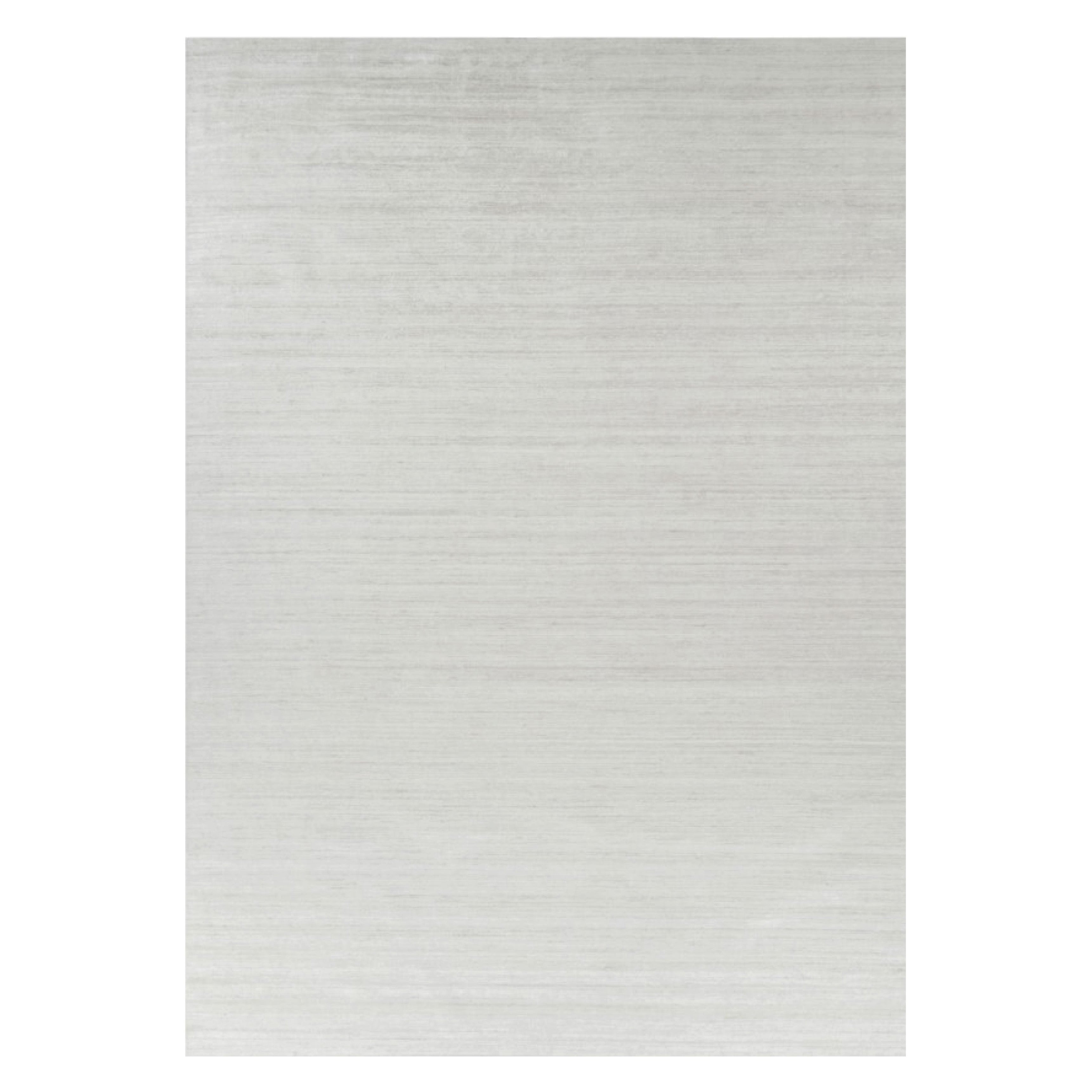 Rug & Kilim’s Oversized Textural Rug In Solid White, Gray and Cream Striae