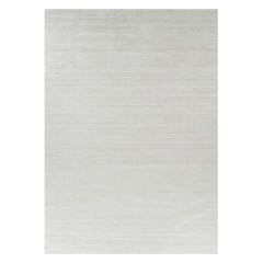 Rug & Kilim’s Oversized Textural Rug In Solid White, Gray and Cream Striae
